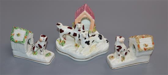 Three Staffordshire porcelain toy figures of dogs and kennels, c.1830-50, H. 5.5cm - 6.5cm
